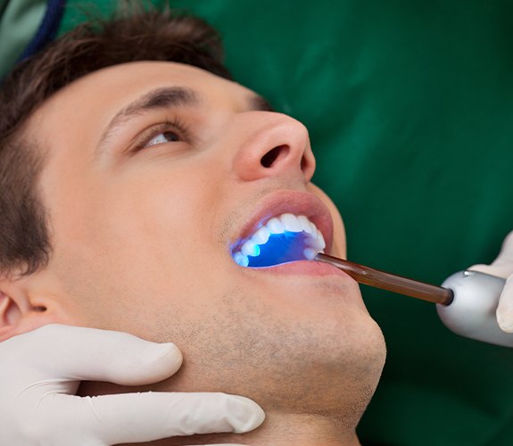 Patient receiving cosmetic dental bonding treatment