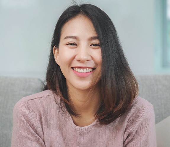 Woman with beautiful smile after gum recontouring