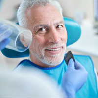 Man with dentures in Lake Zurich