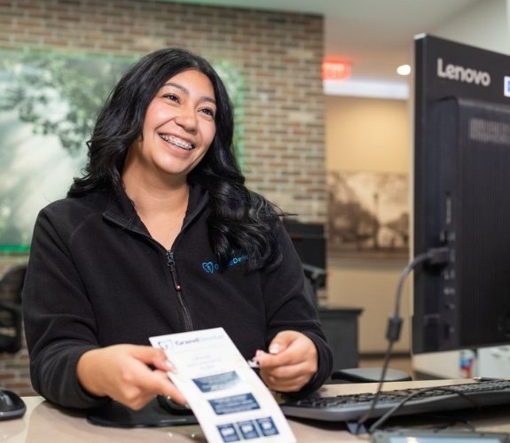 Man discussing the cost of treating dental emergencies