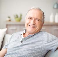 Man smiling with dental implants in Lake Zurich