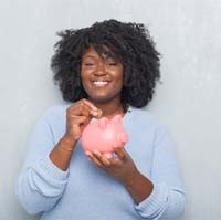 Woman with piggy bank in Lake Zurich