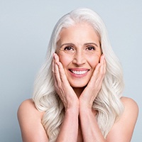 Woman smiling with dental implants in Lake Zurich