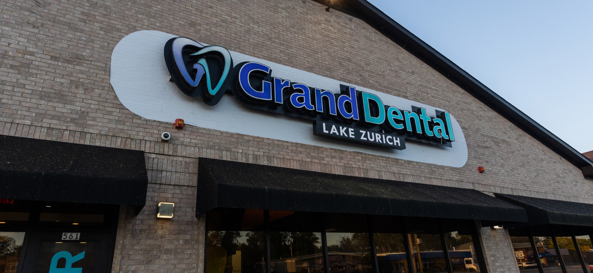 Family of four outside their Lake Zurich dental office