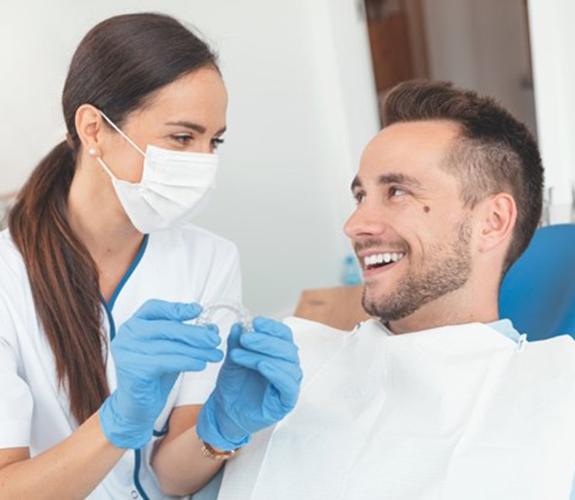 dentist and patient discussing Invisalign in Lake Zurich 