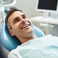 Man smiling in the dentist’s chair