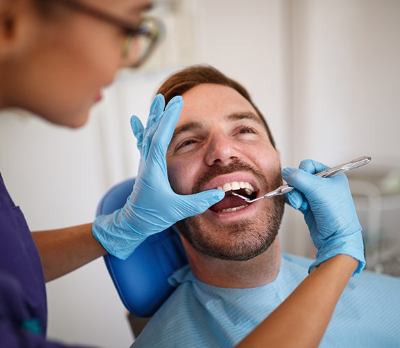 Man examined during preventive dentistry checkup