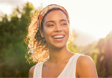 Older woman  smiling after replacing missing teeth