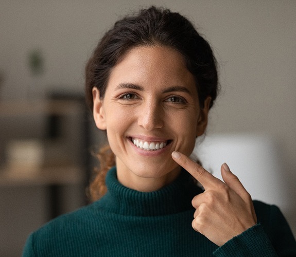 Woman smiling after cost of teeth whitening in Lake Zurich