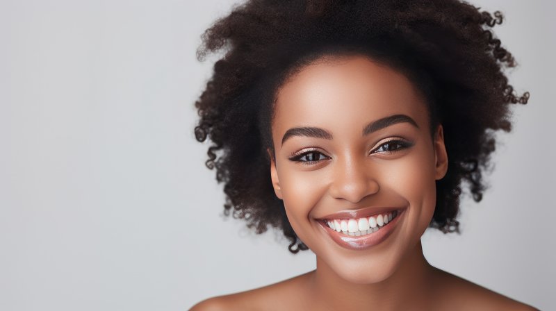 young woman showing off whiter teeth