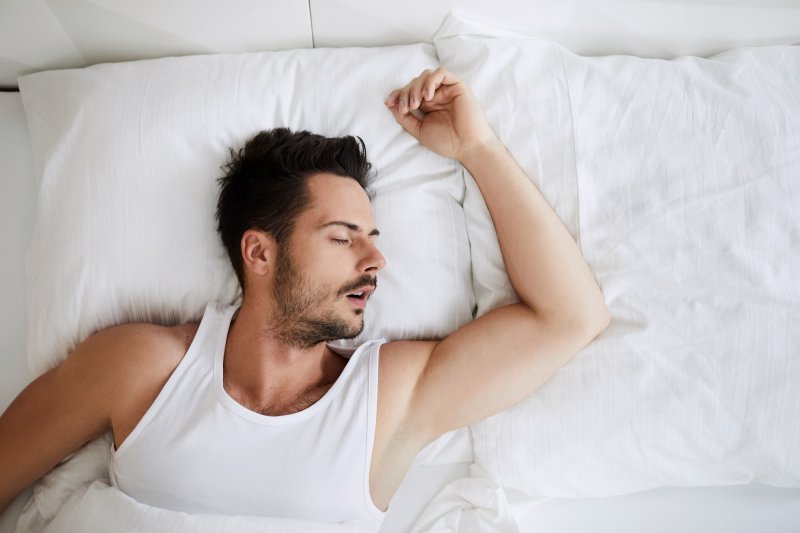 man asleep with his mouth open